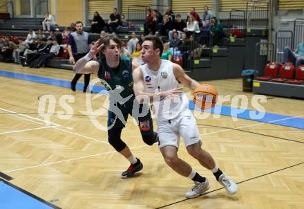 Basketball 2. Liga 2024/2025. Grunddurchgang 17. Runde.  KOS Celovec gegen Dornbirn Lions.   Niklas Michel (KOS Celovec), Pauls Miglinieks   (Dornbirn Lions). Klagenfurt, am 1.2.2025.
Foto: Kuess


---
pressefotos, pressefotografie, kuess, qs, qspictures, sport, bild, bilder, bilddatenbank