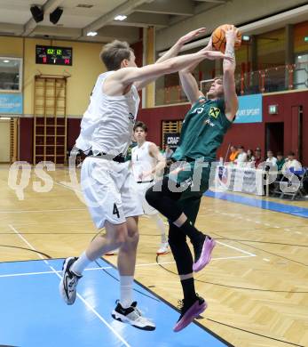 Basketball 2. Liga 2024/2025. Grunddurchgang 17. Runde.  KOS Celovec gegen Dornbirn Lions.   Samuel Seher (KOS Celovec),  Berk Mehmed  (Dornbirn Lions). Klagenfurt, am 1.2.2025.
Foto: Kuess


---
pressefotos, pressefotografie, kuess, qs, qspictures, sport, bild, bilder, bilddatenbank