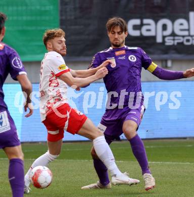 Fussball Bundesliga. SK Austria Klagenfurt gegen Red Bull Salzburg. Thorsten Mahrer  (Austria Klagenfurt), Yorbe Vertessen (Salzburg). Klagenfurt, am 9.2.2025.
Foto: Kuess
www.qspictures.net
---
pressefotos, pressefotografie, kuess, qs, qspictures, sport, bild, bilder, bilddatenbank