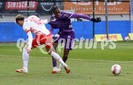 Fussball Bundesliga. SK Austria Klagenfurt gegen Red Bull Salzburg. Dikeni Salifou ( Austria Klagenfurt), Bobby-Lamont Clark (Salzburg). Klagenfurt, am 9.2.2025.
Foto: Kuess
www.qspictures.net
---
pressefotos, pressefotografie, kuess, qs, qspictures, sport, bild, bilder, bilddatenbank