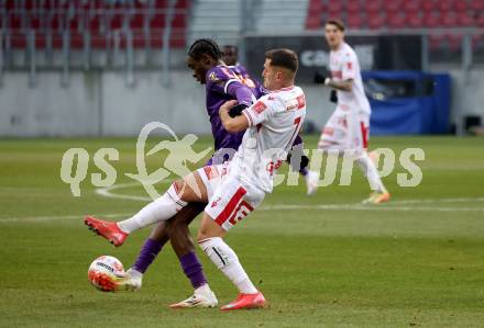 Fussball Bundesliga. SK Austria Klagenfurt gegen GAK. Dikeni Salifou  (Klagenfurt), Murat Satin  (GAK). Klagenfurt, am 22.2.2025.
Foto: Kuess
---
pressefotos, pressefotografie, kuess, qs, qspictures, sport, bild, bilder, bilddatenbank