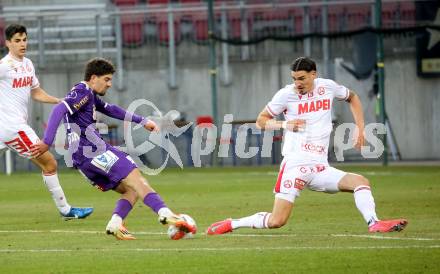 Fussball Bundesliga. SK Austria Klagenfurt gegen GAK. Ben Bobzien  (Klagenfurt), Antonio Tikvic  (GAK). Klagenfurt, am 22.2.2025.
Foto: Kuess
---
pressefotos, pressefotografie, kuess, qs, qspictures, sport, bild, bilder, bilddatenbank