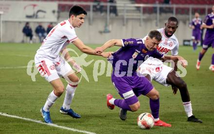 Fussball Bundesliga. SK Austria Klagenfurt gegen GAK. Christopher Wernitznig  (Klagenfurt), Milos Jovicic,, Sadik Fofana   (GAK). Klagenfurt, am 22.2.2025.
Foto: Kuess
---
pressefotos, pressefotografie, kuess, qs, qspictures, sport, bild, bilder, bilddatenbank