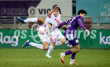 Fussball Bundesliga. SK Austria Klagenfurt gegen GAK.  Ben Bobzien  (Klagenfurt), Murat Satin  (GAK). Klagenfurt, am 22.2.2025.
Foto: Kuess
---
pressefotos, pressefotografie, kuess, qs, qspictures, sport, bild, bilder, bilddatenbank