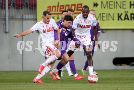 Fussball Bundesliga. SK Austria Klagenfurt gegen GAK. Ben Bobzien  (Klagenfurt), Murat Satin  (GAK). Klagenfurt, am 22.2.2025.
Foto: Kuess
---
pressefotos, pressefotografie, kuess, qs, qspictures, sport, bild, bilder, bilddatenbank