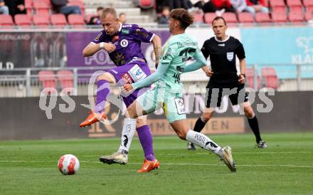 Fussball Bundesliga. SK Austria Klagenfurt gegen Hartberg. Florian Jaritz (SK Austria Klagenfurt), Muharem Huskovic (Hartberg). Klagenfurt, am 23.5.2025.
Foto: Kuess
www.qspictures.net
---
pressefotos, pressefotografie, kuess, qs, qspictures, sport, bild, bilder, bilddatenbank