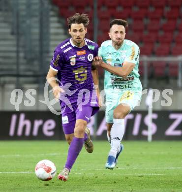 Fussball Bundesliga. SK Austria Klagenfurt gegen Hartberg. Thorsten Mahrer,  (SK Austria Klagenfurt), Patrik Mijic (Hartberg). Klagenfurt, am 23.5.2025.
Foto: Kuess
www.qspictures.net
---
pressefotos, pressefotografie, kuess, qs, qspictures, sport, bild, bilder, bilddatenbank