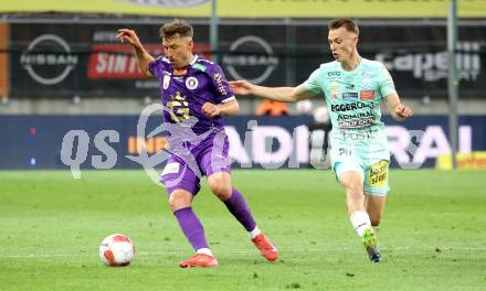 Fussball Bundesliga. SK Austria Klagenfurt gegen TSV Hartberg. Christopher Wernitznig (SK Austria Klagenfurt), Manuel Pfeifer (Hartberg). Klagenfurt, am 23.5.2025.
Foto: Kuess
www.qspictures.net
---
pressefotos, pressefotografie, kuess, qs, qspictures, sport, bild, bilder, bilddatenbank