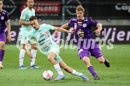 Fussball Bundesliga. SK Austria Klagenfurt gegen TSV Hartberg. Martin Hinteregger (SK Austria Klagenfurt), Manuel Pfeifer  (Hartberg). Klagenfurt, am 23.5.2025.
Foto: Kuess
www.qspictures.net
---
pressefotos, pressefotografie, kuess, qs, qspictures, sport, bild, bilder, bilddatenbank