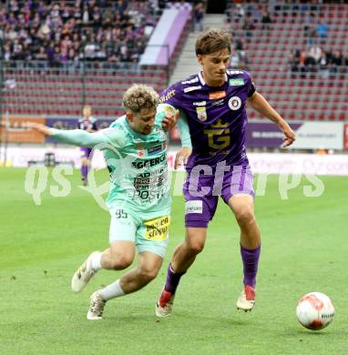 Fussball Bundesliga. SK Austria Klagenfurt gegen TSV Hartberg. Matteo Kitz  (SK Austria Klagenfurt), Damjan Kovacevic (Hartberg). Klagenfurt, am 23.5.2025.
Foto: Kuess
www.qspictures.net
---
pressefotos, pressefotografie, kuess, qs, qspictures, sport, bild, bilder, bilddatenbank