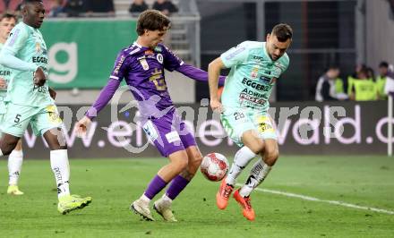 Fussball Bundesliga. SK Austria Klagenfurt gegen TSV Hartberg. Philipp Wydra  (SK Austria Klagenfurt),  Juergen Heil (Hartberg). Klagenfurt, am 23.5.2025.
Foto: Kuess
www.qspictures.net
---
pressefotos, pressefotografie, kuess, qs, qspictures, sport, bild, bilder, bilddatenbank