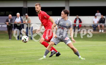 Fussball Kaerntner Liga. Grafenstein gegen Koettmannsdorf. Manuel Rabitsch (Grafenstein),  Marco Modritsch (Koettmannsdorf). Grafenstein, am 1.8..2025.
Foto: Kuess
www.qspictures.net
---
pressefotos, pressefotografie, kuess, qs, qspictures, sport, bild, bilder, bilddatenbank