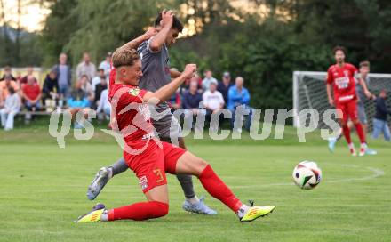 Fussball Kaerntner Liga. Grafenstein gegen Koettmannsdorf.  Dennis Meschnik (Grafenstein),   Amir Mohammadi (Koettmannsdorf). Grafenstein, am 1.8..2025.
Foto: Kuess
www.qspictures.net
---
pressefotos, pressefotografie, kuess, qs, qspictures, sport, bild, bilder, bilddatenbank