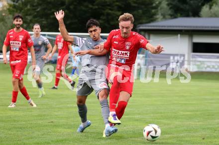 Fussball Kaerntner Liga. Grafenstein gegen Koettmannsdorf.  Dennis Meschnik (Grafenstein),   Amir Mohammadi (Koettmannsdorf). Grafenstein, am 1.8..2025.
Foto: Kuess
www.qspictures.net
---
pressefotos, pressefotografie, kuess, qs, qspictures, sport, bild, bilder, bilddatenbank