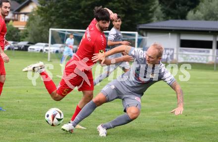 Fussball Kaerntner Liga. Grafenstein gegen Koettmannsdorf.  Dominic Oraze (Grafenstein),  Aner Mandzic (Koettmannsdorf). Grafenstein, am 1.8..2025.
Foto: Kuess
www.qspictures.net
---
pressefotos, pressefotografie, kuess, qs, qspictures, sport, bild, bilder, bilddatenbank