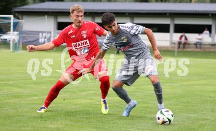 Fussball Kaerntner Liga. Grafenstein gegen Koettmannsdorf. Dennis Meschnik  (Grafenstein), Amir Mohammadi  (Koettmannsdorf). Grafenstein, am 1.8..2025.
Foto: Kuess
www.qspictures.net
---
pressefotos, pressefotografie, kuess, qs, qspictures, sport, bild, bilder, bilddatenbank