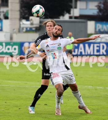 Fussball Bundesliga. Wolfsberger AC  gegen SCR Altach. Markus Pink  (Wolfsberg),  Paul-Friedrich Koller  (Altach). Wolfsberg, am 2.8..2025.
Foto: Kuess
www.qspictures.net
---
pressefotos, pressefotografie, kuess, qs, qspictures, sport, bild, bilder, bilddatenbank