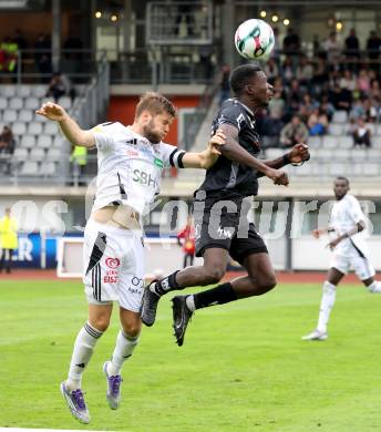 Fussball Bundesliga. Wolfsberger AC  gegen SCR Altach.  Dominik Baumgartner  (Wolfsberg),   Ousmane Diawara (Altach). Wolfsberg, am 2.8..2025.
Foto: Kuess
www.qspictures.net
---
pressefotos, pressefotografie, kuess, qs, qspictures, sport, bild, bilder, bilddatenbank