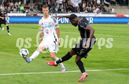 Fussball Bundesliga. Wolfsberger AC  gegen SCR Altach.  Marco Alessandro Sulzner (Wolfsberg),  Mohamed Ouedraogo  (Altach). Wolfsberg, am 2.8..2025.
Foto: Kuess
www.qspictures.net
---
pressefotos, pressefotografie, kuess, qs, qspictures, sport, bild, bilder, bilddatenbank
