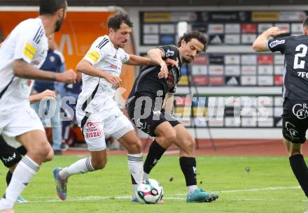 Fussball Bundesliga. Wolfsberger AC  gegen SCR Altach.  Alessandro Schoepf (Wolfsberg),  Vesel Demaku  (Altach). Wolfsberg, am 2.8..2025.
Foto: Kuess
www.qspictures.net
---
pressefotos, pressefotografie, kuess, qs, qspictures, sport, bild, bilder, bilddatenbank
