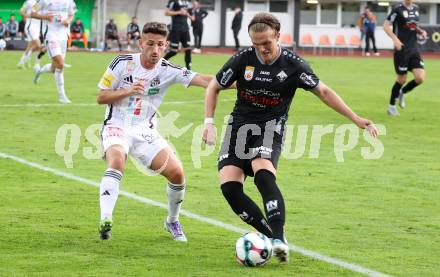 Fussball Bundesliga. Wolfsberger AC  gegen SCR Altach.  Donis Avdijaj (Wolfsberg),  Paul-Friedrich Koller  (Altach). Wolfsberg, am 2.8..2025.
Foto: Kuess
www.qspictures.net
---
pressefotos, pressefotografie, kuess, qs, qspictures, sport, bild, bilder, bilddatenbank