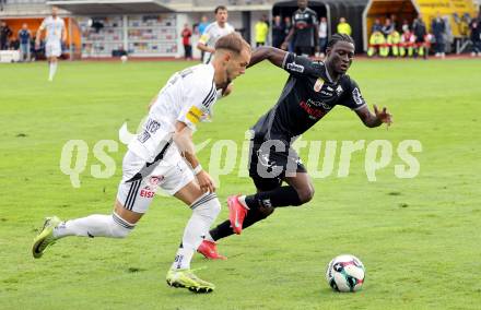 Fussball Bundesliga. Wolfsberger AC  gegen SCR Altach.  Angelo Gattermayer (Wolfsberg),  Mohamed Ouedraogo  (Altach). Wolfsberg, am 2.8..2025.
Foto: Kuess
www.qspictures.net
---
pressefotos, pressefotografie, kuess, qs, qspictures, sport, bild, bilder, bilddatenbank