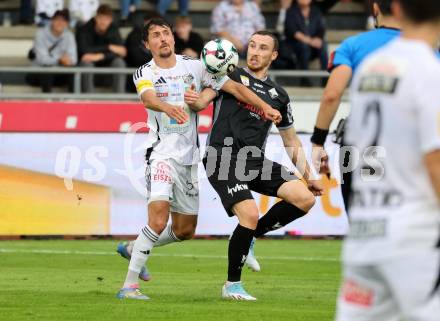 Fussball Bundesliga. Wolfsberger AC  gegen SCR Altach.  Alessandro Schoepf (Wolfsberg),   Mike Steven Baehre (Altach). Wolfsberg, am 2.8..2025.
Foto: Kuess
www.qspictures.net
---
pressefotos, pressefotografie, kuess, qs, qspictures, sport, bild, bilder, bilddatenbank