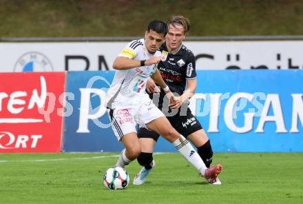 Fussball Bundesliga. Wolfsberger AC  gegen SCR Altach. Dejan Zukic  (WAC), Paul Friedrich Koller  (Altach). Wolfsberg, am 2.8..2025.
Foto: Kuess
www.qspictures.net
---
pressefotos, pressefotografie, kuess, qs, qspictures, sport, bild, bilder, bilddatenbank