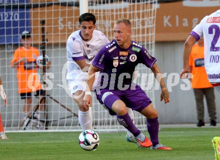 Fussball 2. Liga. SK Austria Klagenfurt gegen Young Violett Austria Wien. Florian Jaritz  (Klagenfurt),  Dejan Radonjic  (Wien). Klagenfurt, 8.8.2025.
Foto: Kuess
www.qspictures.net
---
pressefotos, pressefotografie, kuess, qs, qspictures, sport, bild, bilder, bilddatenbank