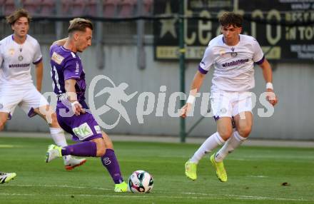 Fussball 2. Liga. SK Austria Klagenfurt gegen Young Violett Austria Wien.  Marc Andre Schmerboeck, (Klagenfurt),  Felix Fischer  (Wien). Klagenfurt, 8.8.2025.
Foto: Kuess
www.qspictures.net
---
pressefotos, pressefotografie, kuess, qs, qspictures, sport, bild, bilder, bilddatenbank