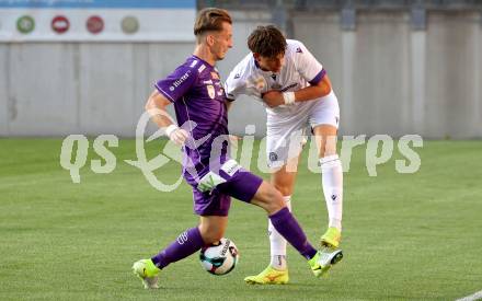 Fussball 2. Liga. SK Austria Klagenfurt gegen Young Violets Austria Wien. Marc Andre Schmerboeck  (Klagenfurt), Felix Fischer (Wien).  Klagenfurt, 8.8.2025.
Foto: Kuess
www.qspictures.net
---
pressefotos, pressefotografie, kuess, qs, qspictures, sport, bild, bilder, bilddatenbank