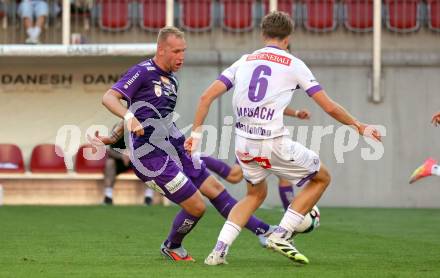 Fussball 2. Liga. SK Austria Klagenfurt gegen Young Violets Austria Wien. Florian Jaritz  (Klagenfurt), Philipp Maybach (Wien). Klagenfurt, 8.8.2025.
Foto: Kuess
www.qspictures.net
---
pressefotos, pressefotografie, kuess, qs, qspictures, sport, bild, bilder, bilddatenbank
