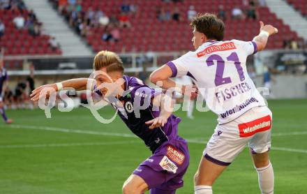 Fussball 2. Liga. SK Austria Klagenfurt gegen Young Violets Austria Wien. Marc Andre Schmerboeck  (Klagenfurt), Felix Fischer (Wien).  Klagenfurt, 8.8.2025.
Foto: Kuess
www.qspictures.net
---
pressefotos, pressefotografie, kuess, qs, qspictures, sport, bild, bilder, bilddatenbank