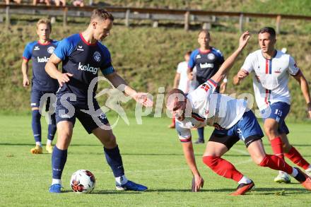 Fussball Unterliga Mitte. Arriach gegen Ludmannsdorf.  Gaber Petric (Arriach),  Michael Jakopitsch  (Ludmannsdorf).  Arriach, am 9.8.2025.
Foto. Kuess
www.qspictures.net
---
pressefotos, pressefotografie, kuess, qs, qspictures, sport, bild, bilder, bilddatenbank