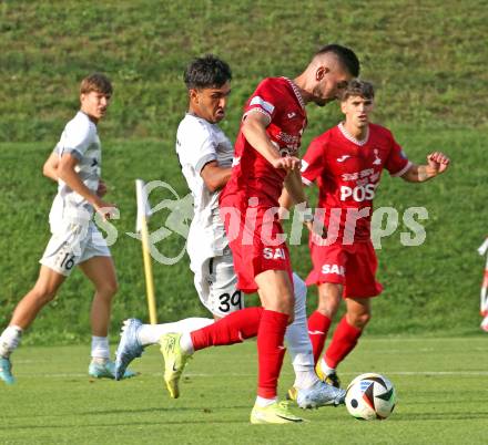 Fussball Kaerntner Liga.  Koettmannsdorf gegen SAK. Amir Mohammadi  (Koettmannsdorf),   Hrvoje Jakovljevic  (SAK).  Klagenfurt, am 17.8.2025.
Foto. Kuess
www.qspictures.net
---
pressefotos, pressefotografie, kuess, qs, qspictures, sport, bild, bilder, bilddatenbank