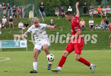 Fussball Kaerntner Liga.  Koettmannsdorf gegen SAK. Matteo Juvan  (Koettmannsdorf), Zan Kumer    (SAK).  Klagenfurt, am 17.8.2025.
Foto. Kuess
www.qspictures.net
---
pressefotos, pressefotografie, kuess, qs, qspictures, sport, bild, bilder, bilddatenbank
