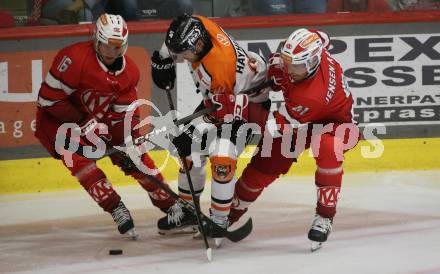 Eishockey Bundesliga. Testspiel. KAC gegen Grizzlys Wolfsburg. Simeon Schwinger, Jesper Jensen Aabo  (KAC),          Jacob Hayhurst ( Wolfsburg) Klagenfurt, am 20.8.2025.
Foto: Kuess 
www.qspictures.net
---
pressefotos, pressefotografie, kuess, qs, qspictures, sport, bild, bilder, bilddatenbank