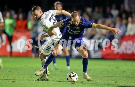 Fussball OEFB Cup. Velden gegen Hartberg.  Mario Kroepfl (Velden),  Juergen Heil   (Hartberg). Velden, am 27.8.2025.
Foto: Kuess
www.qspictures.net
---
pressefotos, pressefotografie, kuess, qs, qspictures, sport, bild, bilder, bilddatenbank