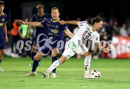 Fussball OEFB Cup. Velden gegen Hartberg. Mario Kroepfl  (Velden),  Dominik Prokop  (Hartberg). Velden, am 27.8.2025.
Foto: Kuess
www.qspictures.net
---
pressefotos, pressefotografie, kuess, qs, qspictures, sport, bild, bilder, bilddatenbank