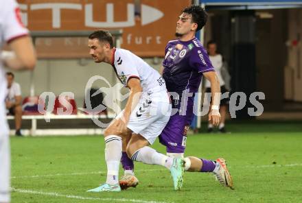 Fussball 2. Liga. SK Austria Klagenfurt gegen Admira Wacker. Almir Oda  (Klagenfurt), Turgay Gemicibasi   (Admira). Klagenfurt, 29.8.2025.
Foto: Kuess
www.qspictures.net
---
pressefotos, pressefotografie, kuess, qs, qspictures, sport, bild, bilder, bilddatenbank
