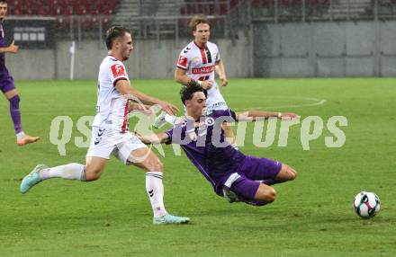 Fussball 2. Liga. SK Austria Klagenfurt gegen Admira Wacker. Elias Jandrisevits  (Klagenfurt), Turgay Gemicibasi   (Admira). Klagenfurt, 29.8.2025.
Foto: Kuess
www.qspictures.net
---
pressefotos, pressefotografie, kuess, qs, qspictures, sport, bild, bilder, bilddatenbank