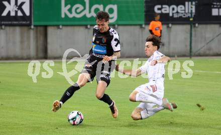 Fussball 2. Liga. SK Austria Klagenfurt gegen FC Hertha Wels..  Elias Jandrisevits (Klagenfurt),  Sebastian Malinowski  (Wels).  Klagenfurt, 26.9.2025.
Foto: Kuess
www.qspictures.net
---
pressefotos, pressefotografie, kuess, qs, qspictures, sport, bild, bilder, bilddatenbank