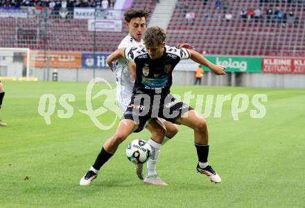 Fussball 2. Liga. SK Austria Klagenfurt gegen FC Hertha Wels..  Elias Jandrisevits (Klagenfurt),  Pascal Mueller  (Wels).  Klagenfurt, 26.9.2025.
Foto: Kuess
www.qspictures.net
---
pressefotos, pressefotografie, kuess, qs, qspictures, sport, bild, bilder, bilddatenbank