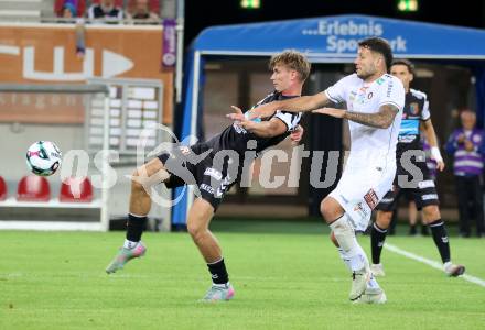 Fussball 2. Liga. SK Austria Klagenfurt gegen FC Hertha Wels.  Marco Gantschnig (Klagenfurt),  Roman Steinmann  (Wels).  Klagenfurt, 26.9.2025.
Foto: Kuess
www.qspictures.net
---
pressefotos, pressefotografie, kuess, qs, qspictures, sport, bild, bilder, bilddatenbank