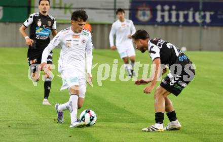 Fussball 2. Liga. SK Austria Klagenfurt gegen FC Hertha Wels. Armin Karic (Klagenfurt),  Miroslav Cirkovic  (Wels).  Klagenfurt, 26.9.2025.
Foto: Kuess
www.qspictures.net
---
pressefotos, pressefotografie, kuess, qs, qspictures, sport, bild, bilder, bilddatenbank