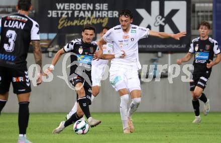 Fussball 2. Liga. SK Austria Klagenfurt gegen FC Hertha Wels. Marcel Krnjic  (Klagenfurt),  Albin Gashi  (Wels).  Klagenfurt, 26.9.2025.
Foto: Kuess
www.qspictures.net
---
pressefotos, pressefotografie, kuess, qs, qspictures, sport, bild, bilder, bilddatenbank