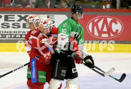 Eishockey ICE Bundesliga. KAC gegen Olimpija Ljubljana.  Raphael Herburger (KAC),  Miha Bericic (Olimpija Ljubljana). Klagenfurt, am 26.10.2025
Foto: Kuess
---
pressefotos, pressefotografie, kuess, qs, qspictures, sport, bild, bilder, bilddatenbank