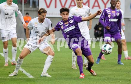 Fussball 2. Liga. SK Austria Klagenfurt gegen Amstetten.  Aidan Liu  (Klagenfurt), Sebastian Wimmer  (Amstetten).  Klagenfurt, 22.11..2025.
Foto: Kuess
www.qspictures.net
---
pressefotos, pressefotografie, kuess, qs, qspictures, sport, bild, bilder, bilddatenbank