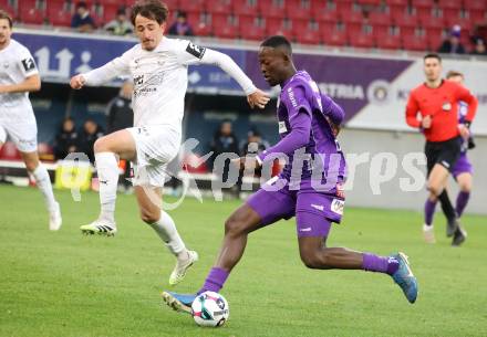 Fussball 2. Liga. SK Austria Klagenfurt gegen Amstetten.  Dimitrie Deumi Nappi  (Klagenfurt),Joshua Steiger   (Amstetten).  Klagenfurt, 22.11..2025.
Foto: Kuess
www.qspictures.net
---
pressefotos, pressefotografie, kuess, qs, qspictures, sport, bild, bilder, bilddatenbank