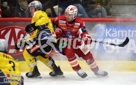 Eishockey ICE Bundesliga.  Winn2day ICE Hockey League. KAC gegen Vienna Capitals.  Jesper Jensen Aabo  (KAC),    Leon Wallner (Vienna Capitals). Klagenfurt am 21.11.2025.
Foto: Kuess
www.qspictures.net
---
pressefotos, pressefotografie, kuess, qs, qspictures, sport, bild, bilder, bilddatenbank
